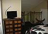 View of loft sleeping area and TV.