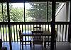 Screend in lanai with garden view.