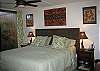 King size pillow top bed, ceiling fan, window a/c, computer