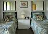 Twin beds in upstairs bed room. Ceiling fan.