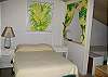 Double bed and twin bed.  Bath in loft also.
Ceiling fan.
