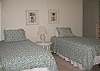 Twin beds, ceiling fan