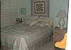 Queen size bed, window a/c, ceiling fan.