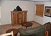 Sleeper sofa and tv with dvd located in the entertainment room.
