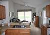 ...view from kitchen towrads family room and the pool outside...