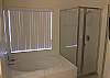 ...the large garden tub with walk-in shower in the Master bathroom...