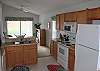 ...right wing of the kitchen with large fridge-freezer including ice-maker too...