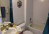 ...bathroom with vanity, shower and toilet...
