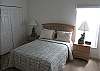 ...Master bedroom with Queen bed and large walk-in closet...