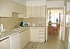 Central Gulf Coast Condominium rental - Interior Photo - A view of our modern kitchen