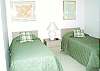Central Gulf Coast Condominium rental - Interior Photo - A view of our second bedroom featuring 2 twin beds.