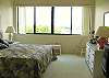 Siesta Key Condominium rental - Interior Photo - view of our master bedroom with a king sized bed and a TV