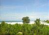 Central Gulf Coast Condominium rental - Interior Photo - A view through our screened in patio - gulf view