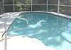 Central Gulf Coast House rental - Exterior Photo - Our Nantucket pool is heated and features a caged in patio area