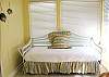Central Gulf Coast House rental - Interior Photo - The sunroom has a futon that can serve as another queen bed