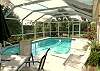 Central Gulf Coast House rental - Interior Photo - Another view of our screened in lanai and pool