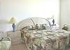 Siesta Key Condominium rental - Interior Photo - Master bedroom has a king sized bed & tv set