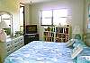 Central Gulf Coast Condominium rental - Interior Photo - A view of our master bedroom with king bed and tv set