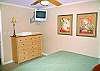 Siesta Key Condominium rental - Interior Photo - Master bedroom features a king bed, a tv set, & private bathroom