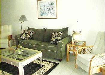 Central Gulf Coast Condominium rental - Exterior Photo - Living room has views through the sliders of the bay.