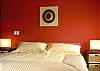 Comfortable queen size bed in guest bedroom