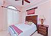 A spacious and beautiful master bedroom with comfortable king size bed