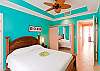 Spacious bedroom with comfortable queen size bed