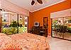 Master bedroom with king size bed, television and looking mirror
