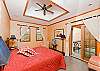 Spacious master bedroom with comfortable king size bed