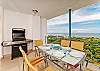 Great terrace with dining and ocean view