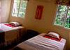 A nice guest bedroom with 2 cozy twin size beds