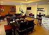 A nice dining area alond side with living room