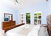 Spacious master bedroom with king size bed