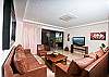 A spacious living room with comfortable sofas