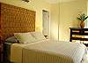 Spacious master bedroom with king size bed