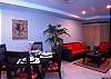 A great and spacious  living area along side with dining and cozy sofas