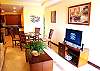 A luxurious view of living room and dining area with custom made center table