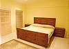 Comfortable queen size be in guest bedroom