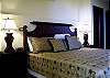 Master bedroom with king size bed.