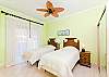 2 twin size comfortable beds is a spacious bedroom