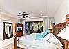 Spacious and beautiful master bedroom with cozy king size bed