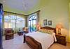 A Spacious master bedroom with queen size bed and nice ocean view