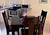 Comfortable dining for 4 guests along side with American standards fully equipped kitchen