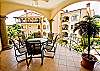 A nive view of Covered terrace with fine furniture