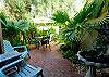 Enjoy your morning coffee listening to the fountain or just taking in the beautiful tropical plants. The pool is just steps from the back gate of this private courtyard.