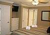 Nicely furnished bedroom w/king size bed and flat screen tv...