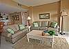 This nicely furnished oceanfront living room makes you feel right at home. Patio located off the living room offers a spectacular view of the ocean. Close access to one of the best beaches the island has to offer.