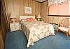 Master bedroom w/a queen size bed.