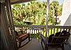 Enjoy your coffee and cocktails from your private balcony with view of the pool and courtyard.