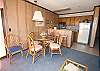 Fully equipped kitchen and dining room.